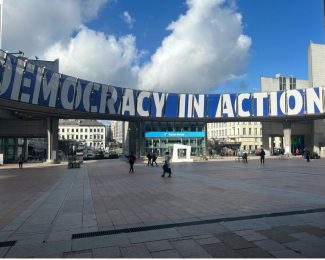 Sign saying 'Democracy in Action'